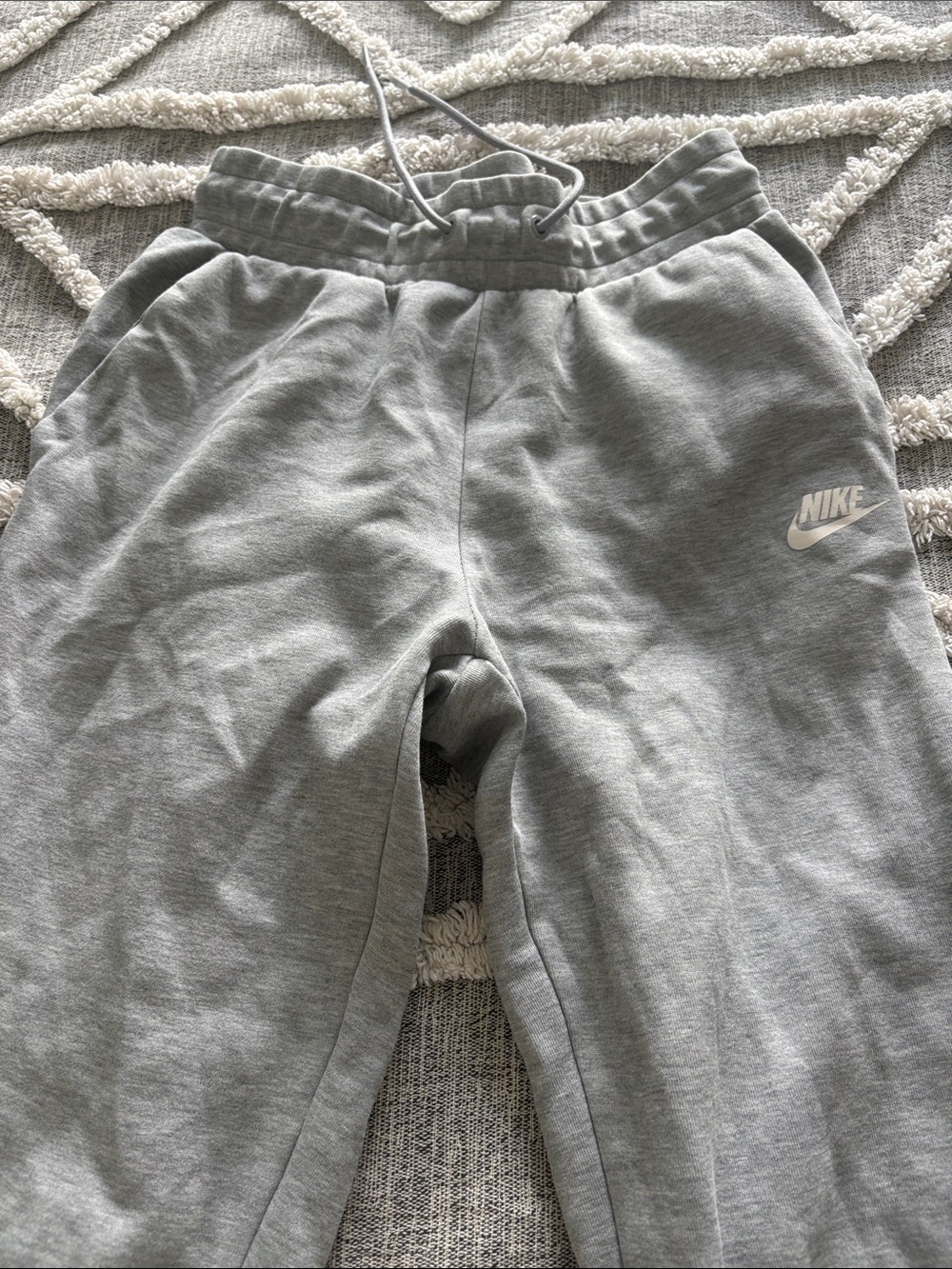 Nike women’s Light Gray Fleece Joggers with Swoosh